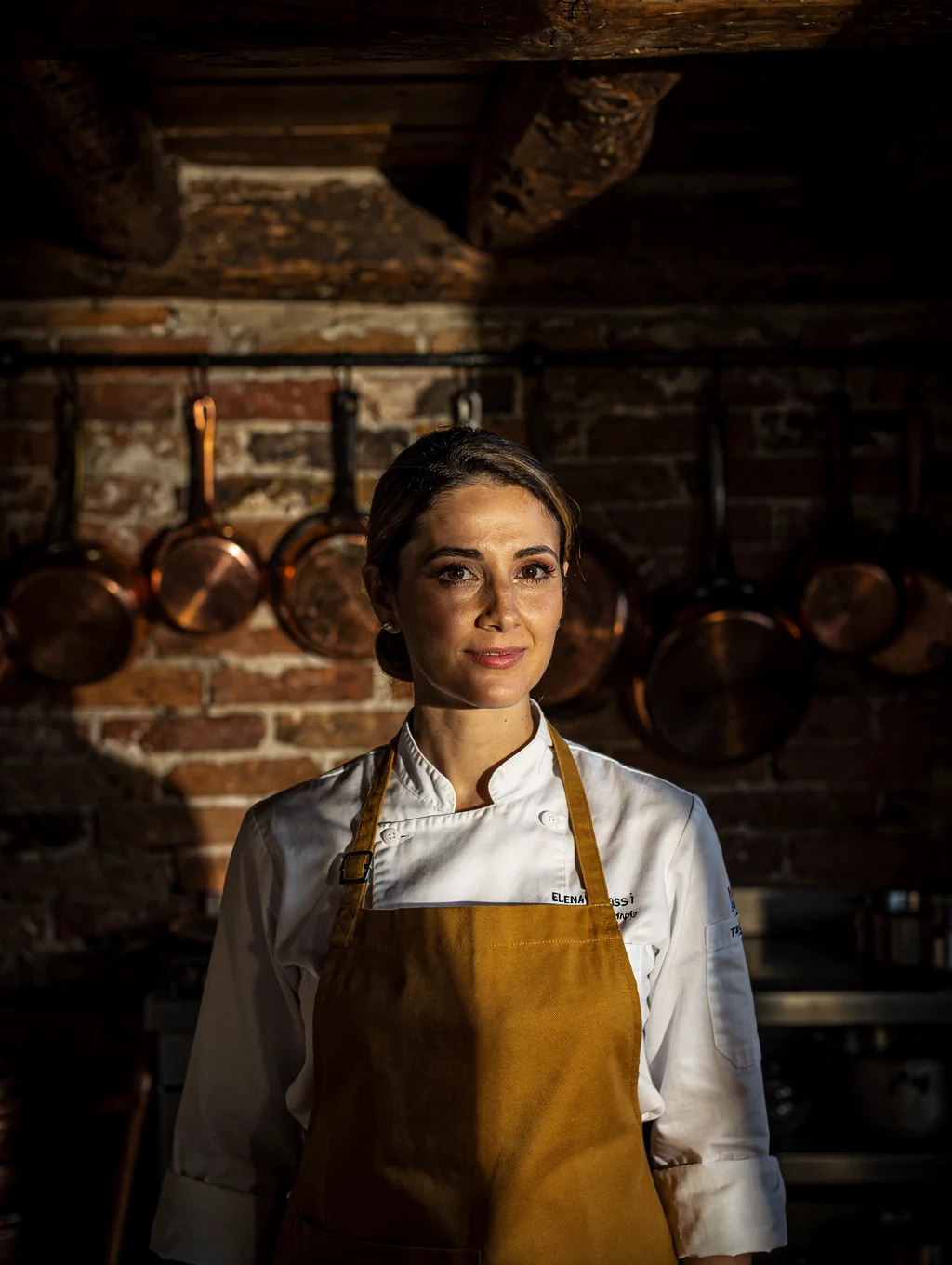 Chef Elena Rossi preparing fresh pasta